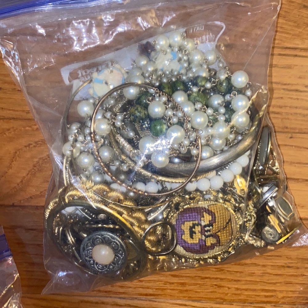 Junk jewelry , some wearable . Most is broken or needs to be fixed